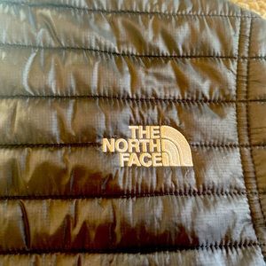 Woman’s size S black Northface vest